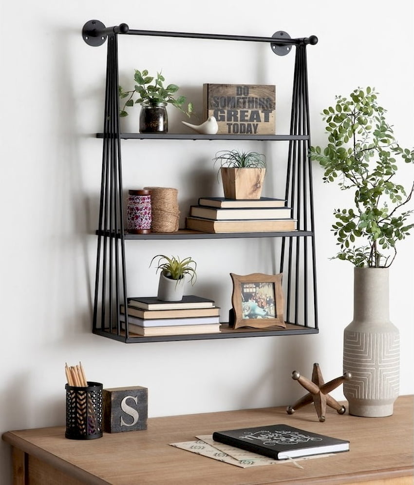 modern wall hanging shelf with books and plants