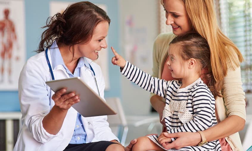 Doctor with a child with ADHD