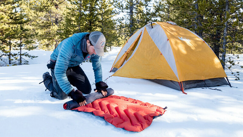 man-camping-on-cold-weather