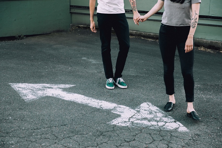 picture of man and woman walking outside wearing comfortable shoes