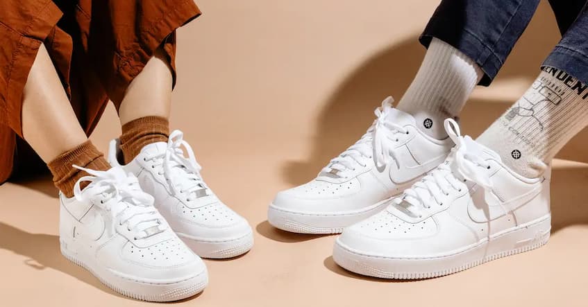 white pairs of sneakers