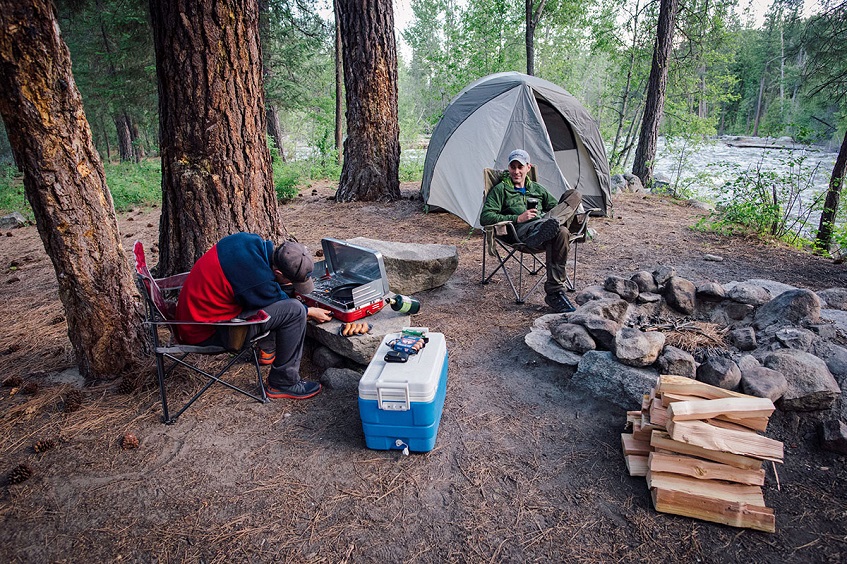 Friends enjoying time in nature while camping