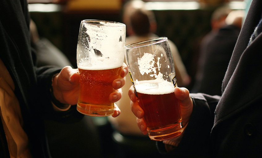 cheers with glass of beer