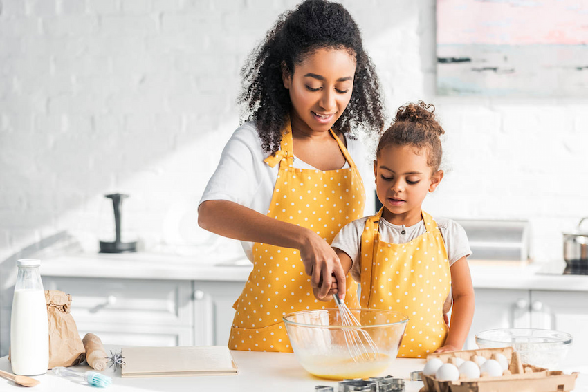 mum and daughter with aprons