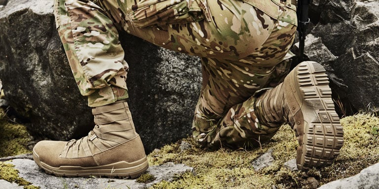 man in military combat uniform and boots 